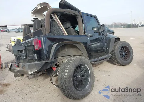 2011 Jeep Wrangler Sport z USA, uszkodzony, nr VIN 1J4AA2D16BL598686